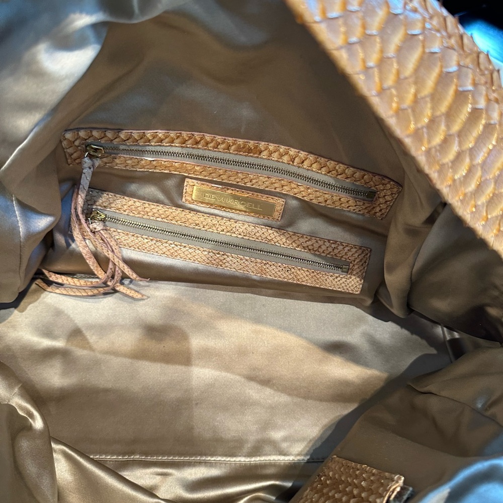 Large python bag color gold.  Not used.